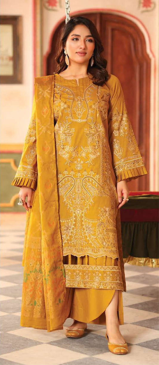 Woman wearing a yellow embroidered traditional outfit in an ornate interior setting