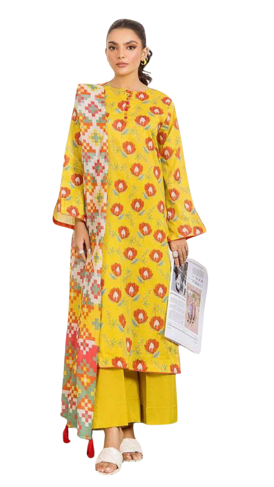 Woman wearing a yellow floral dress holding a magazine on a white background