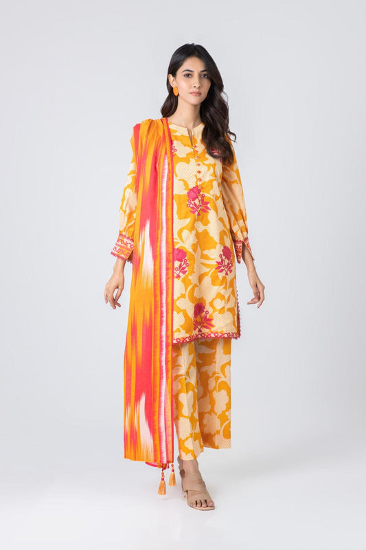 Woman wearing a yellow floral dress with a matching dupatta on a white background