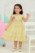 Young girl wearing a light yellow dress