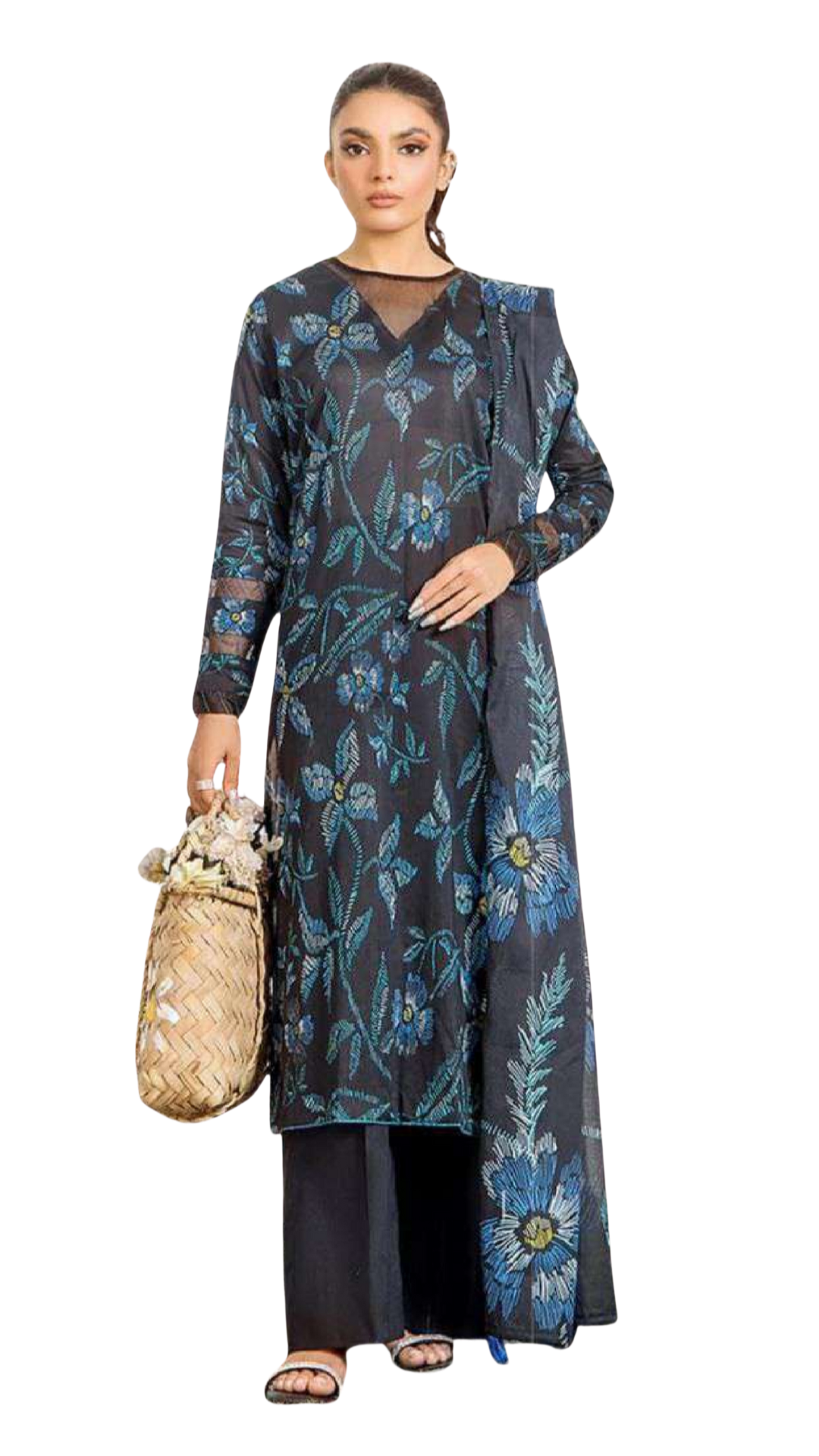Woman wearing a long dark dress with blue floral patterns on a white background