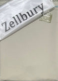 Zellbury mattress with packaging and tag on a neutral background
