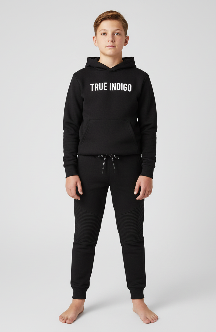 Person wearing a black hoodie with 'TRUE INDIGO' logo on a white background