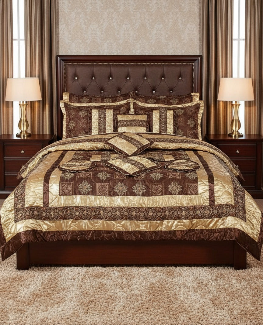 Luxurious bedroom with a brown and beige patterned comforter set on a bed.