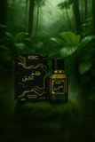 KBC perfume bottle and packaging in a forest setting