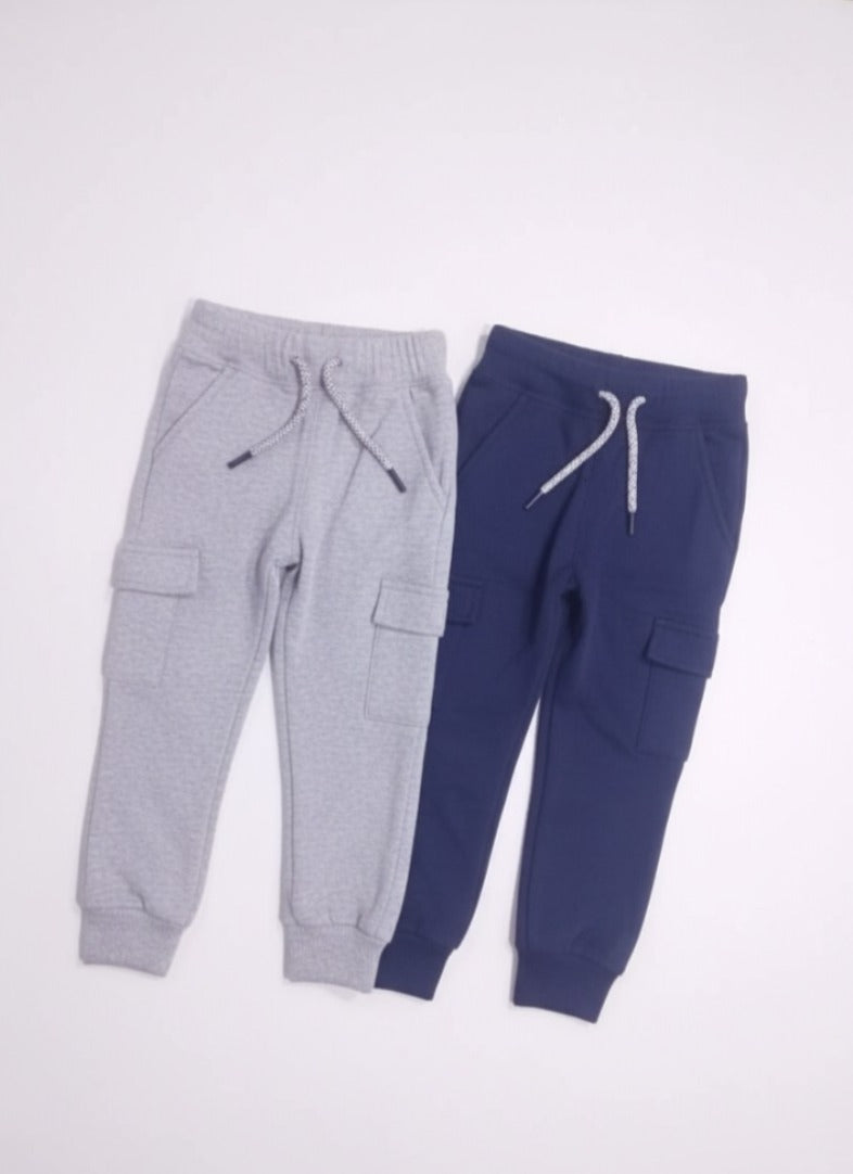 Gray and blue jogger pants on a white background