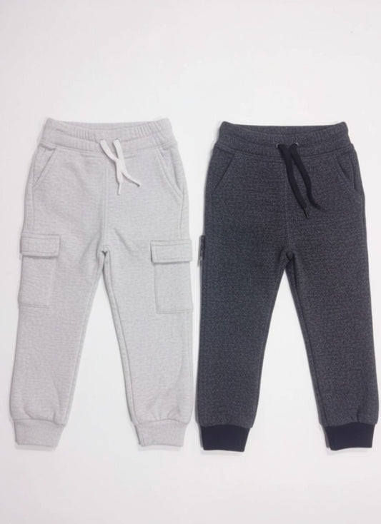 Two pairs of gray jogger pants on a white background