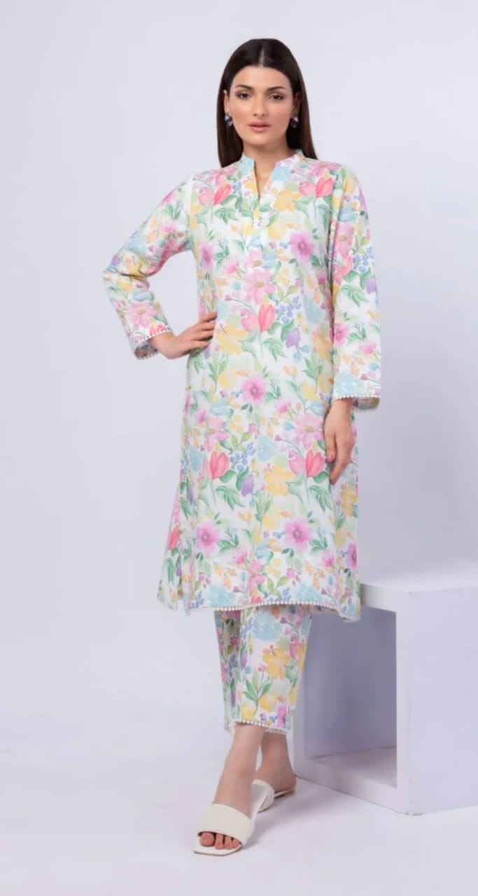 Woman wearing a floral dress with a white background