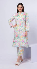 Woman wearing a floral dress with a white background