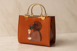 masturd handbag with a decorative design on a beige background