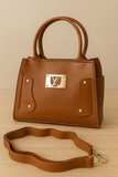 mastard handbag with gold accents on a beige background