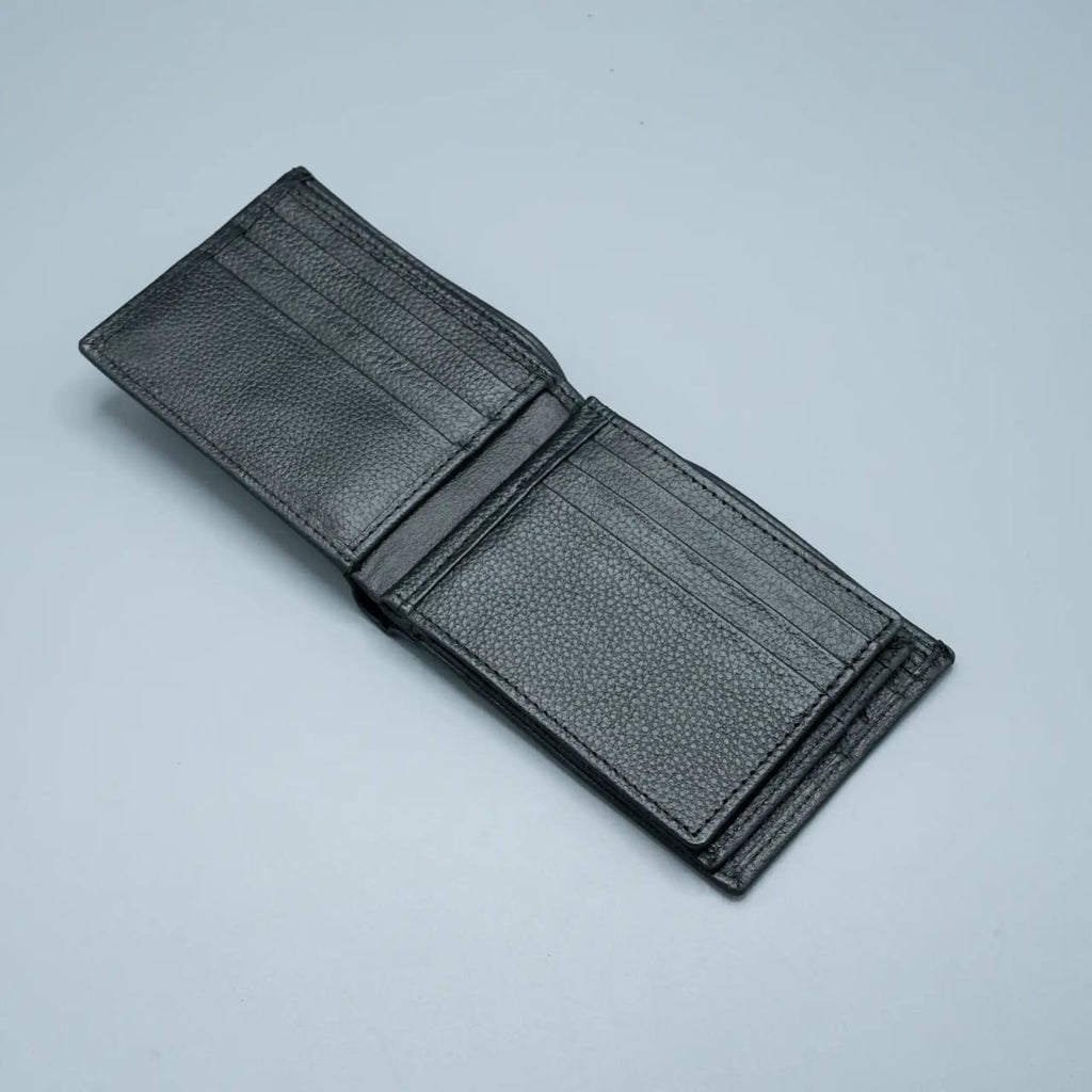 Black leather wallet on a light gray background