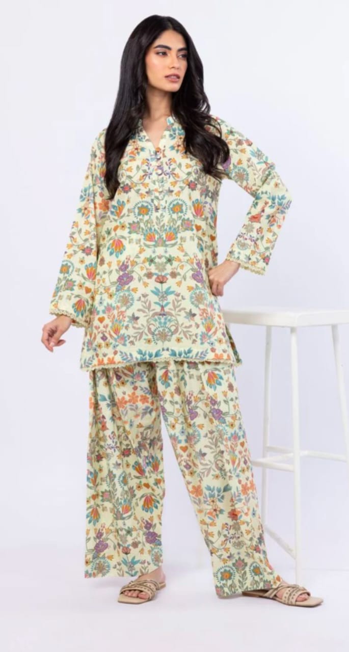 Woman wearing a floral outfit on a white background