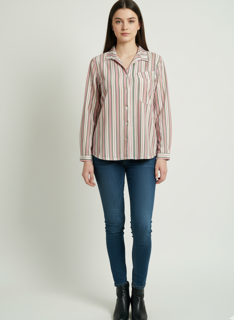 Woman wearing a striped shirt and blue jeans on a white background
